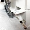 Using the cloth guide on an overlocker