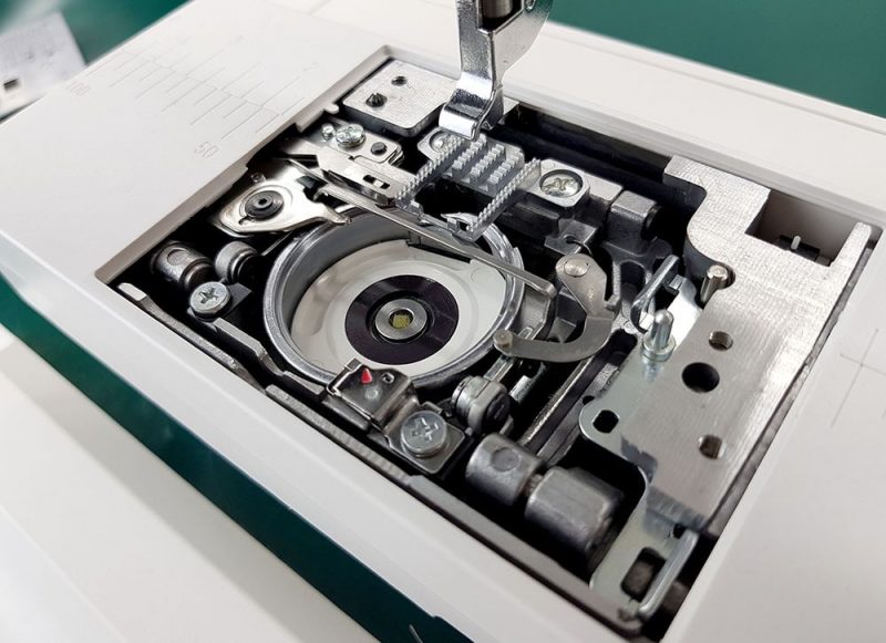 Clean Sewing Machine Bobbin Case