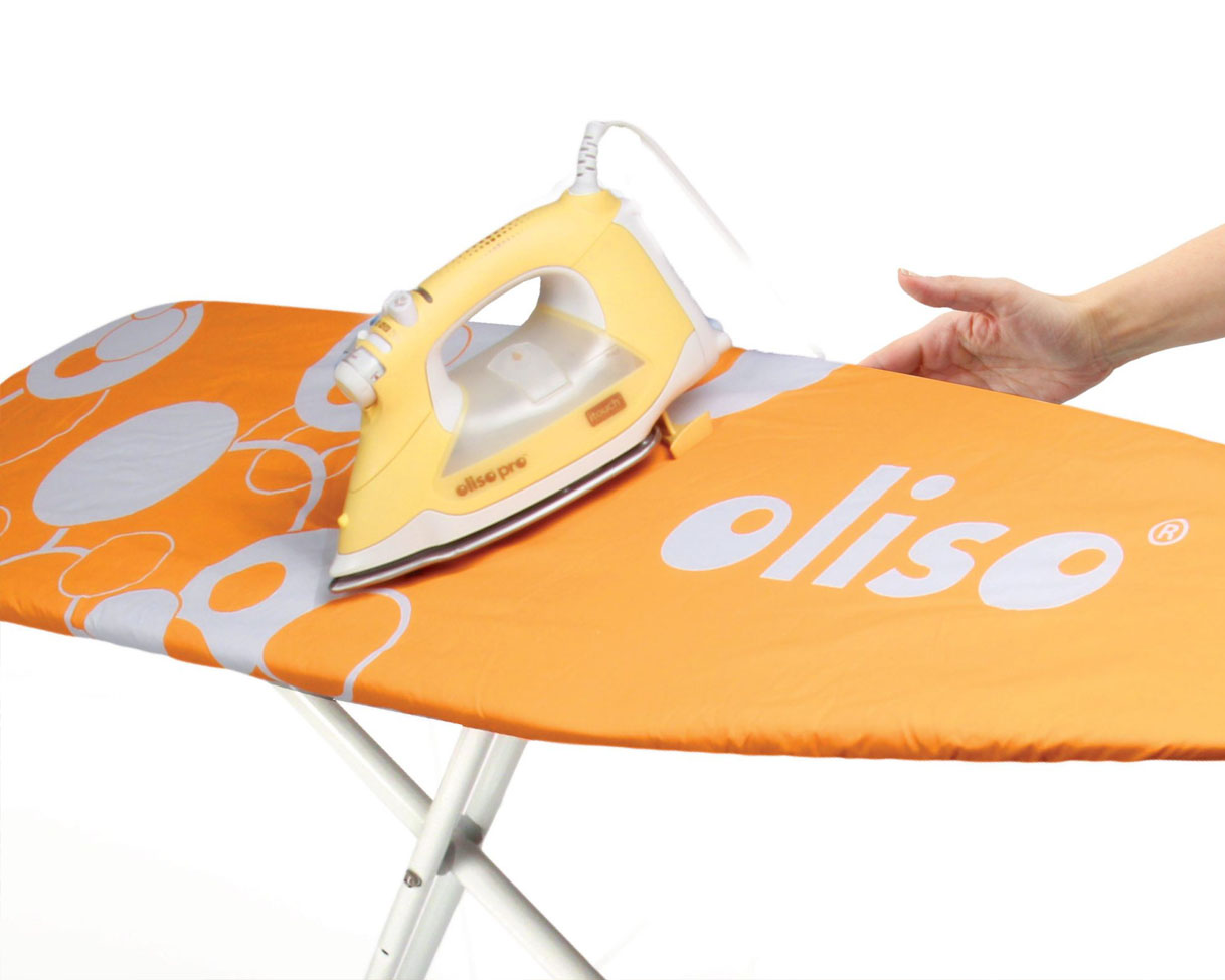 With its feet down, the Oliso can grip onto the Ironing board with ease