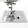 Easy Change Needle Plate on the Janome MC6650 Flat Bed Quilting Machine
