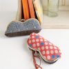 EXTRA CLASP CURVY CLUTCH